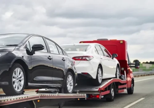 imageye___-_imgi_1_tow-truck-with-broken-car-road-tow-truck-transporting-car-highway-car-service-transportation-concept-roadside-rescue_782515-10081